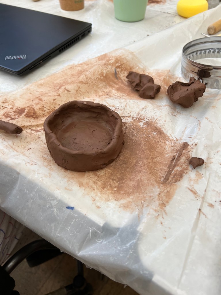 clay pot with thick base and walls. 