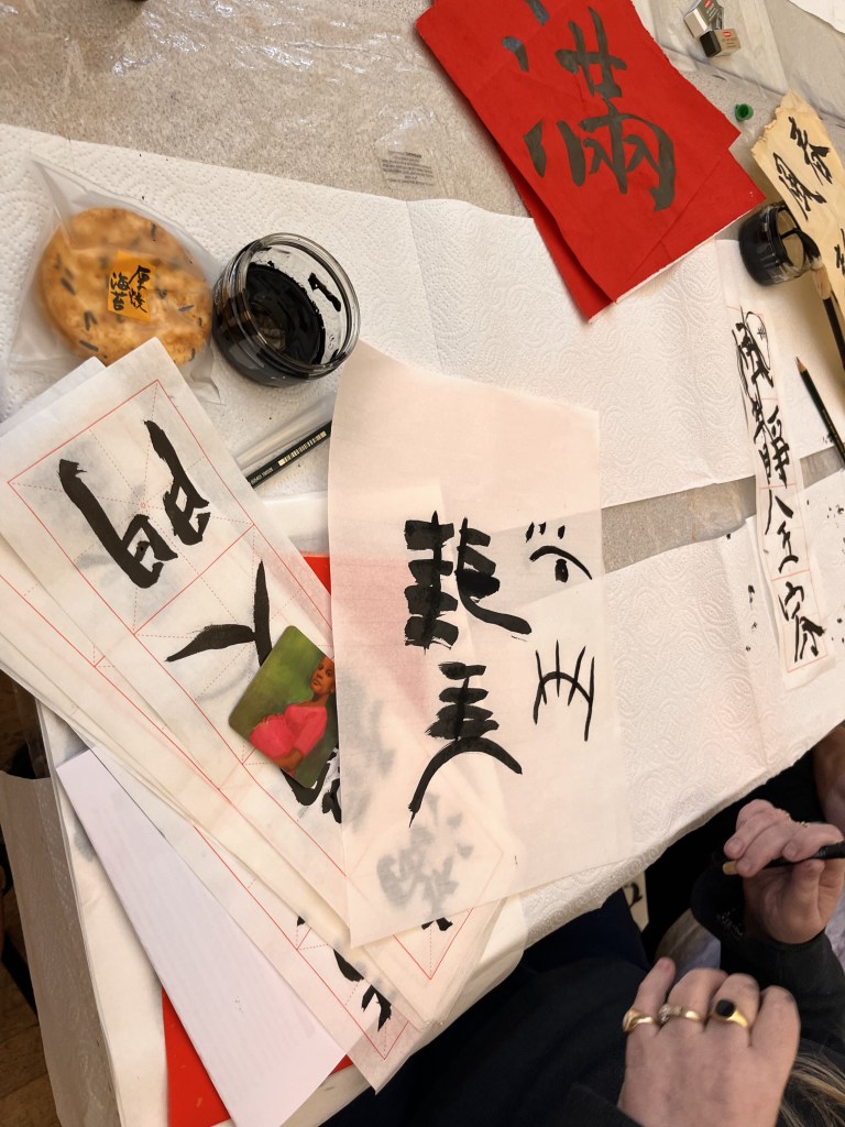 two example of caligraphy made. One is on A4 sized paper the other is on a landscape, smaller sized paper. 