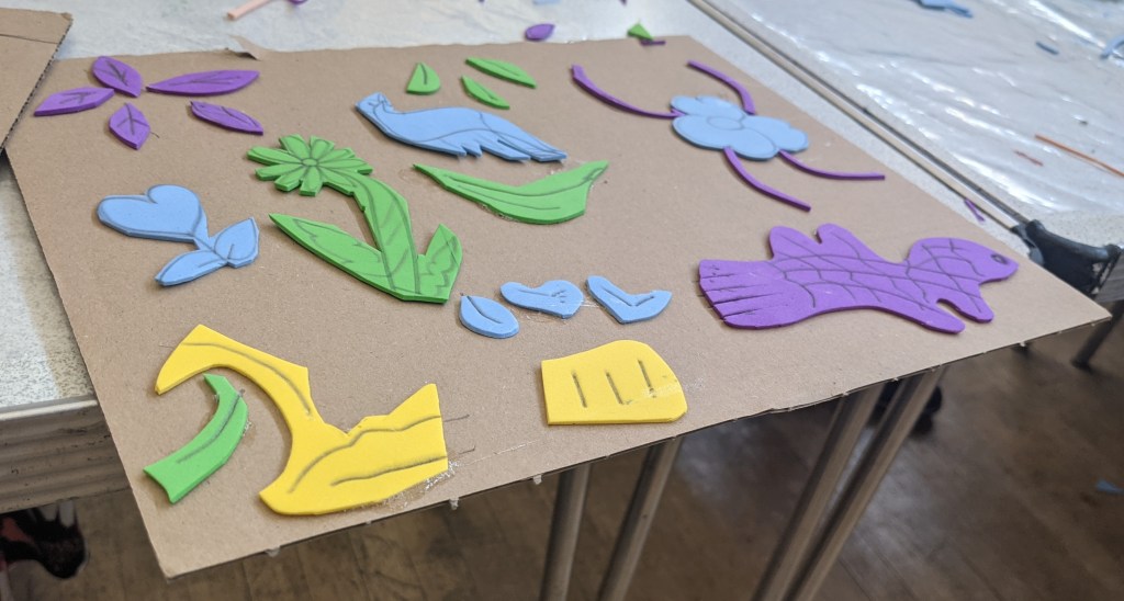 image of various foam stamps. Two are Daffodills.