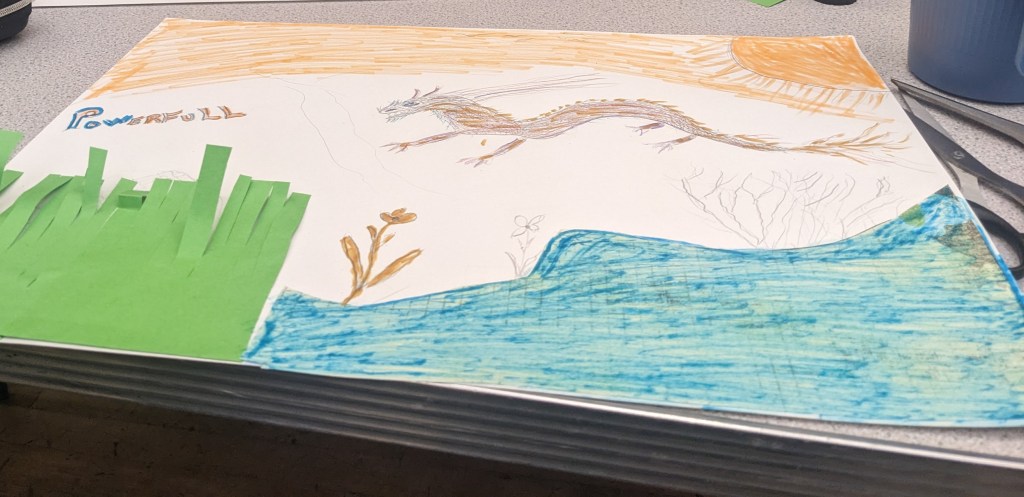 Picture of a dragon with a orange sky and a blue bottom.