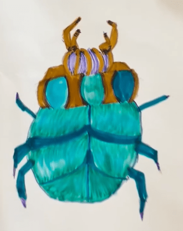 Beetle that has a brown top half and then has blue alternating in shades in a three spot pattern to then being completely blue at the bottom.